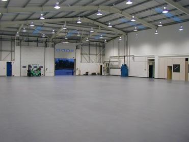 stonlok pvc flooring in airplane hanger